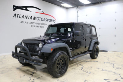Used 2014 Jeep Wrangler Unlimited Sport