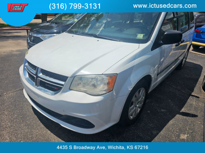 Used 2014 Dodge Grand Caravan American Value Package w/ UConnect Hands-Free Group