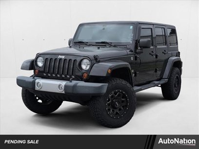 Used 2012 Jeep Wrangler Unlimited Sahara w/ Dual Top Group
