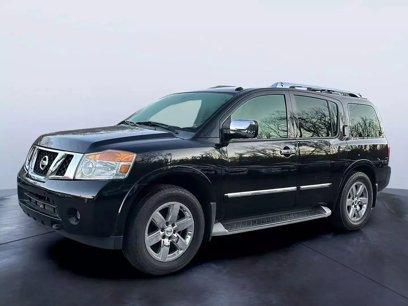 Used 2014 Nissan Armada Platinum w/ 2nd Row Captain Seat Package