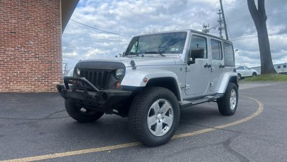 Used 2012 Jeep Wrangler Unlimited Sahara w/ Dual Top Group