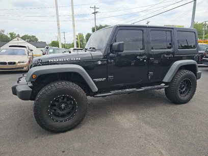 Used 2011 Jeep Wrangler Unlimited Rubicon w/ Dual Top Group