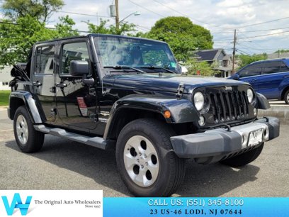 Used 2015 Jeep Wrangler Unlimited Sahara w/ Dual Top Group