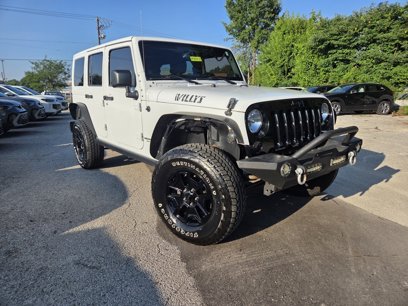 Used 2014 Jeep Wrangler Unlimited Sport