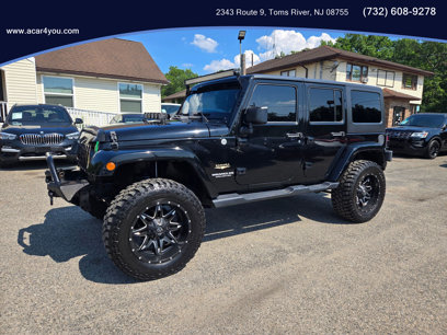 Used 2012 Jeep Wrangler Unlimited Sahara w/ Dual Top Group