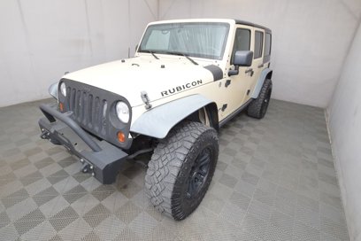 Used 2011 Jeep Wrangler Unlimited Rubicon w/ Dual Top Group