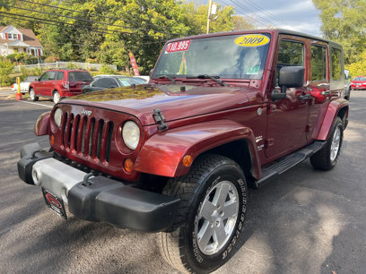 Used 2009 Jeep Wrangler Unlimited Sahara w/ Dual Top Group