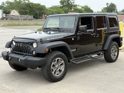 Used 2014 Jeep Wrangler Unlimited Rubicon w/ Dual Top Group