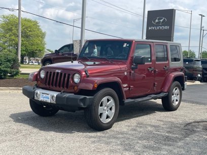 Used 2010 Jeep Wrangler Unlimited Sahara w/ Dual Top Group