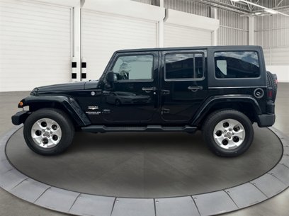 Used 2015 Jeep Wrangler Unlimited Sahara w/ Dual Top Group