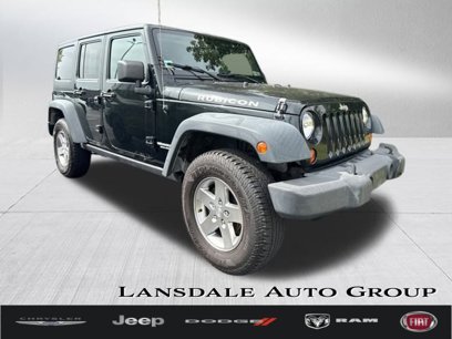 Used 2012 Jeep Wrangler Unlimited Rubicon w/ Dual Top Group