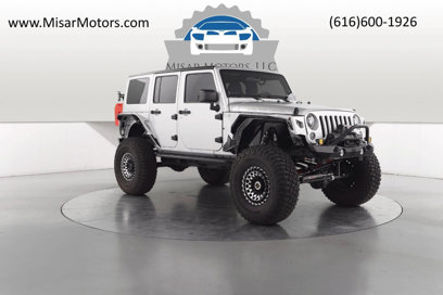 Used 2011 Jeep Wrangler Unlimited Sport w/ Black Appearance Group