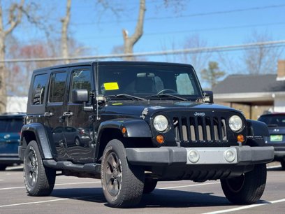Used 2010 Jeep Wrangler Unlimited Sahara w/ Dual Top Group