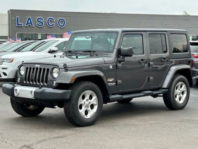 Used 2014 Jeep Wrangler Unlimited Sahara w/ Dual Top Group
