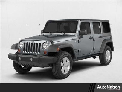 Used 2014 Jeep Wrangler Unlimited Sahara w/ Max Tow Package