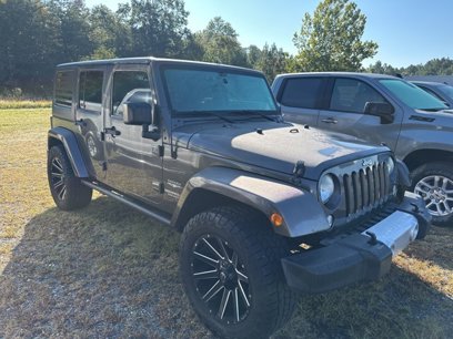 Used 2014 Jeep Wrangler Unlimited Sahara w/ Dual Top Group