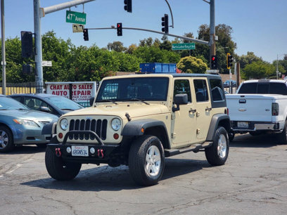 Used 2011 Jeep Wrangler Unlimited Sport
