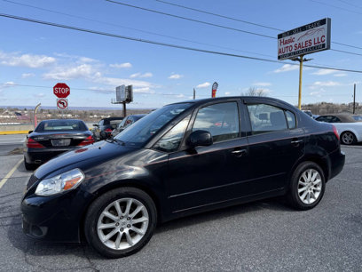 Used 2011 Suzuki SX4 LE Anniversary Edition