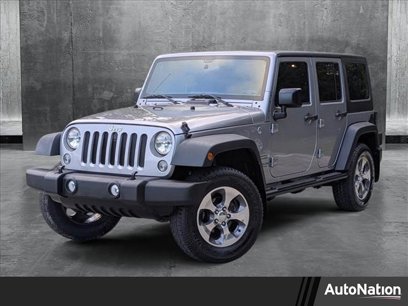 Used 2016 Jeep Wrangler Unlimited Sport w/ Mopar Black Appearance Group