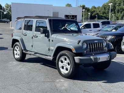 Used 2014 Jeep Wrangler Unlimited Sahara w/ Max Tow Package