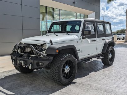 Used 2017 Jeep Wrangler Unlimited Sport w/ Mopar Black Appearance Group
