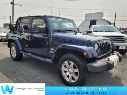 Used 2013 Jeep Wrangler Unlimited Sahara w/ Dual Top Group