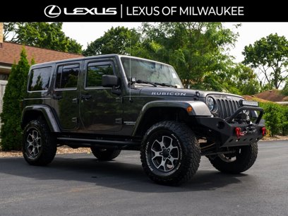 Used 2014 Jeep Wrangler Unlimited Rubicon w/ Dual Top Group