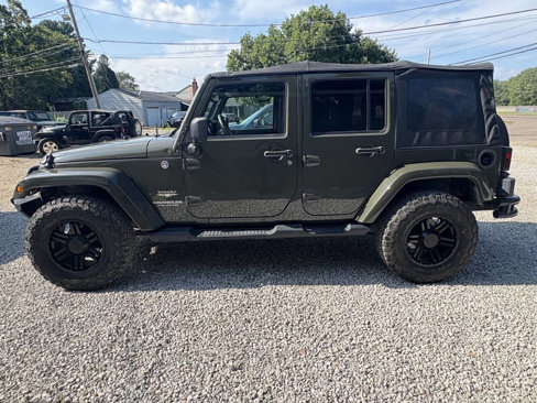 Used 2015 Jeep Wrangler Unlimited Sahara w/ Dual Top Group image 11