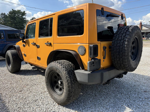 Used 2012 Jeep Wrangler Unlimited Sahara w/ Dual Top Group image 9