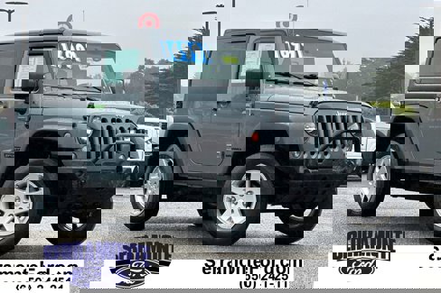 Used 2015 Jeep Wrangler Sport image 1