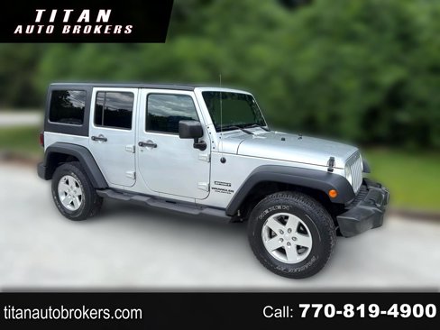 Used 2011 Jeep Wrangler Unlimited Sport image 1