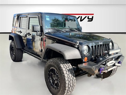 Used 2013 Jeep Wrangler Unlimited Sahara w/ Connectivity Group image 1