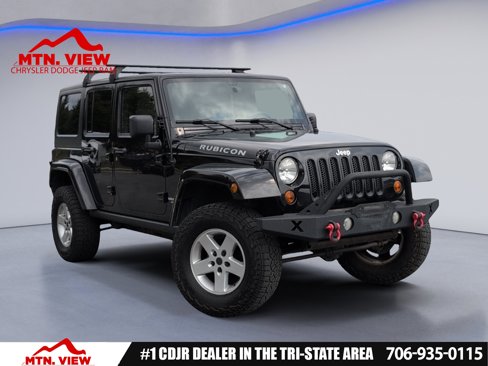 Used 2011 Jeep Wrangler Unlimited Rubicon w/ Dual Top Group image 1