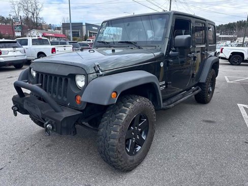 Used 2011 Jeep Wrangler Unlimited Sport image 1