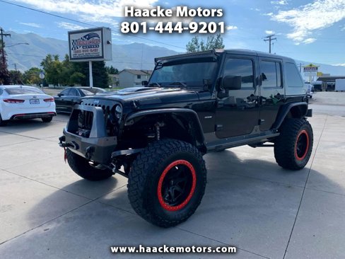 Used 2010 Jeep Wrangler Unlimited Rubicon w/ Dual Top Group image 1