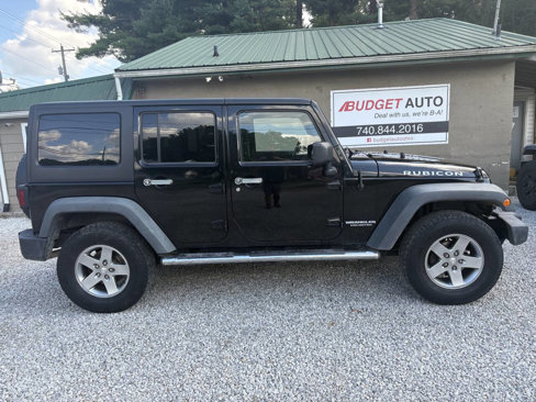 Used 2011 Jeep Wrangler Unlimited Rubicon w/ Dual Top Group image 5