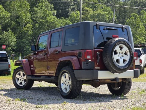 Used 2010 Jeep Wrangler Unlimited Sahara w/ Dual Top Group image 9