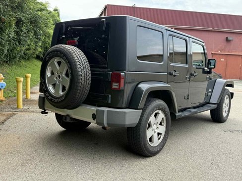 Used 2010 Jeep Wrangler Unlimited Sahara w/ Dual Top Group image 2