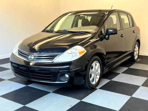 Used 2012 Nissan Versa SL w/ SL Navigation Pkg image 1