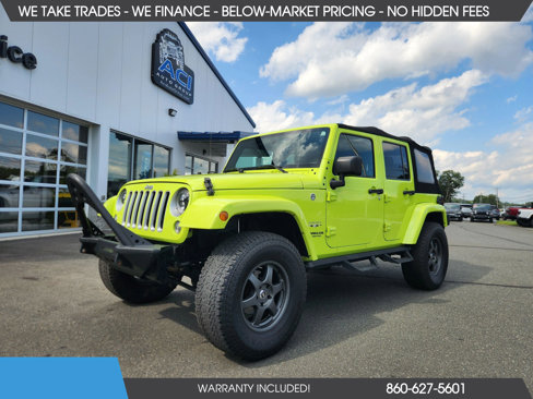 Used 2016 Jeep Wrangler Unlimited Sahara image 1