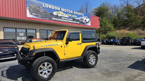 Used 2015 Jeep Wrangler Sport image 1