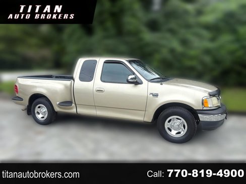 Used 1999 Ford F150 2WD SuperCab image 1