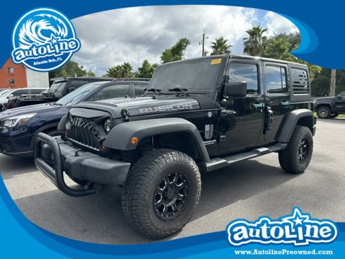 Used 2012 Jeep Wrangler Unlimited Sport image 1