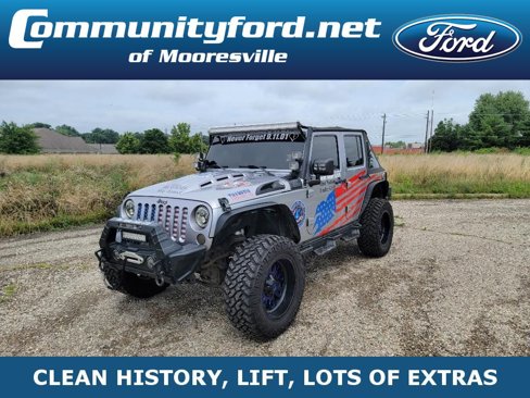 Used 2013 Jeep Wrangler Unlimited Sport image 1