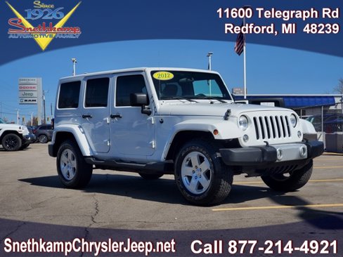 Used 2012 Jeep Wrangler Unlimited Sahara w/ Dual Top Group image 1