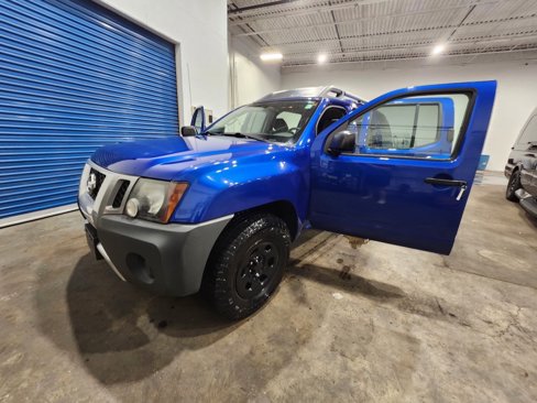 Used 2015 Nissan Xterra X image 1