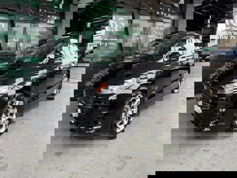 Used 2015 Ford Fusion Energi Titanium image 1