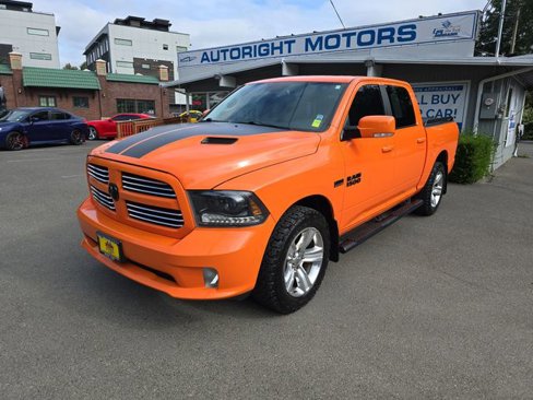 Used 2015 RAM 1500 Sport w/ Ignition Orange Sport Package image 1