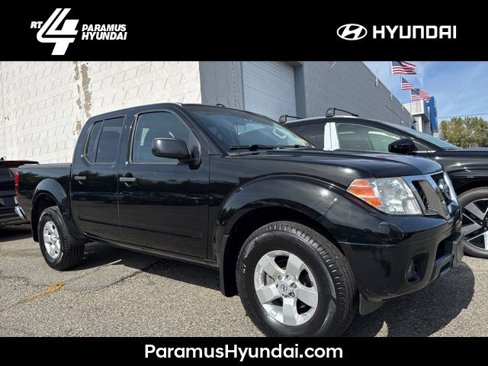 Used 2013 Nissan Frontier SV image 1