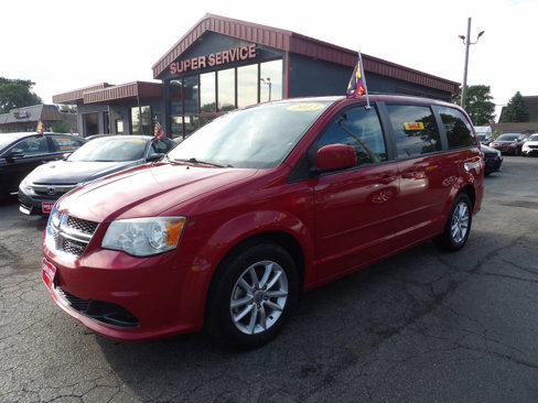 Used 2013 Dodge Grand Caravan SXT w/ Rear Park Assist Pkg image 1